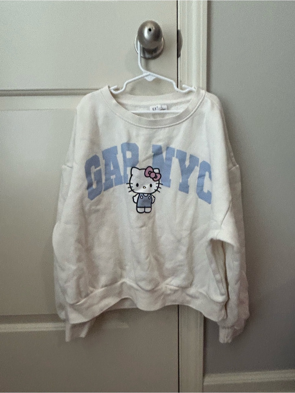 GAP Cream Sweatshirt with Blue GAP NYC and Hello Kitty